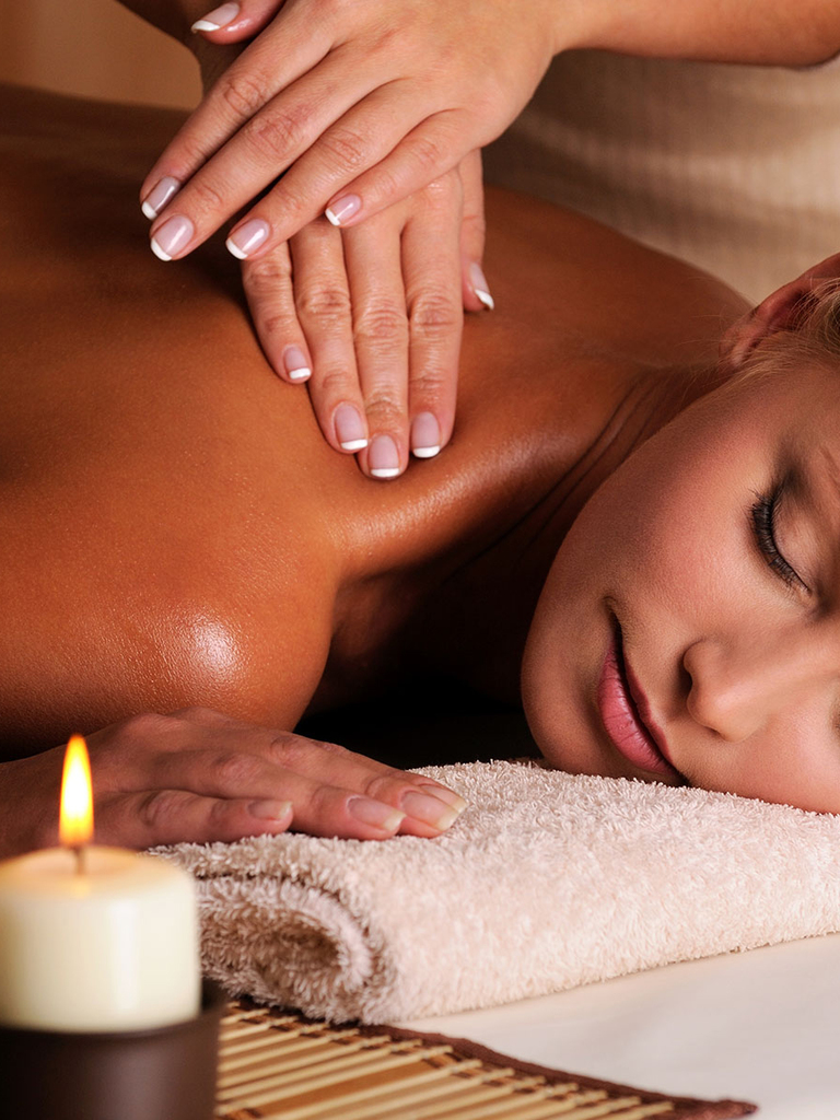 professional masseur doing massaging of female neck